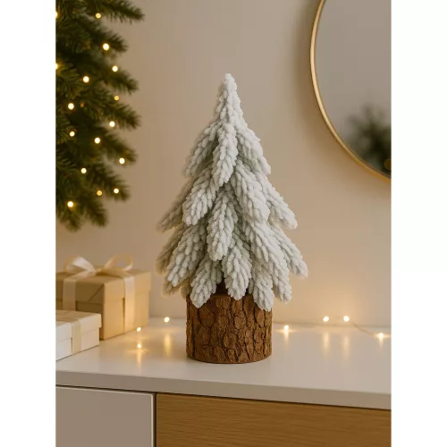 Brad de Crăciun artificial decorativ pe un trunchi acoperit de zăpadă 20 x 9 cm
