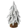 Brad de Crăciun artificial decorativ pe un trunchi acoperit de zăpadă 30 x 10 cm